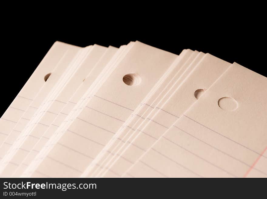 Closeup of a stack of binder paper