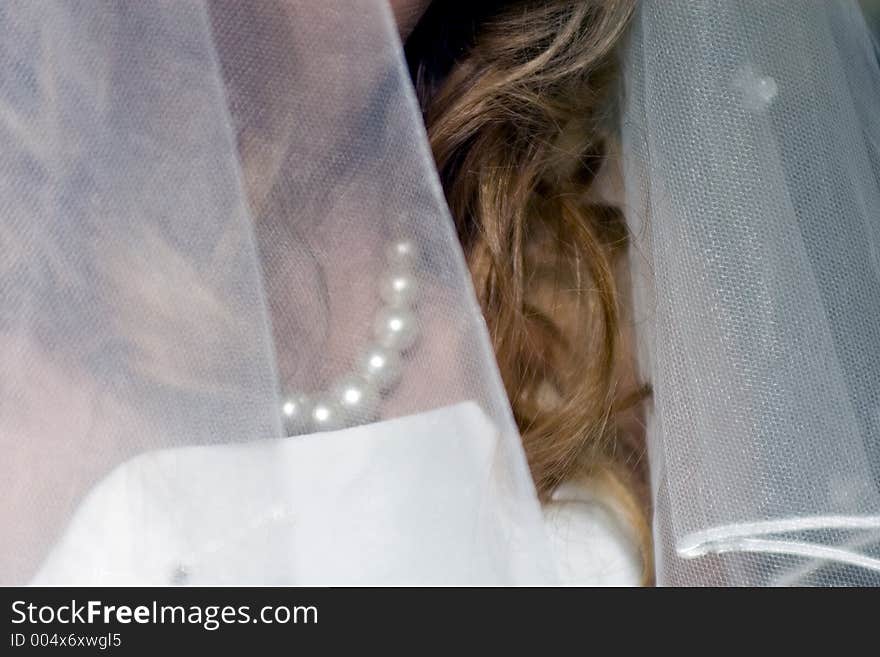 Set of pearls on bride's neck. Set of pearls on bride's neck