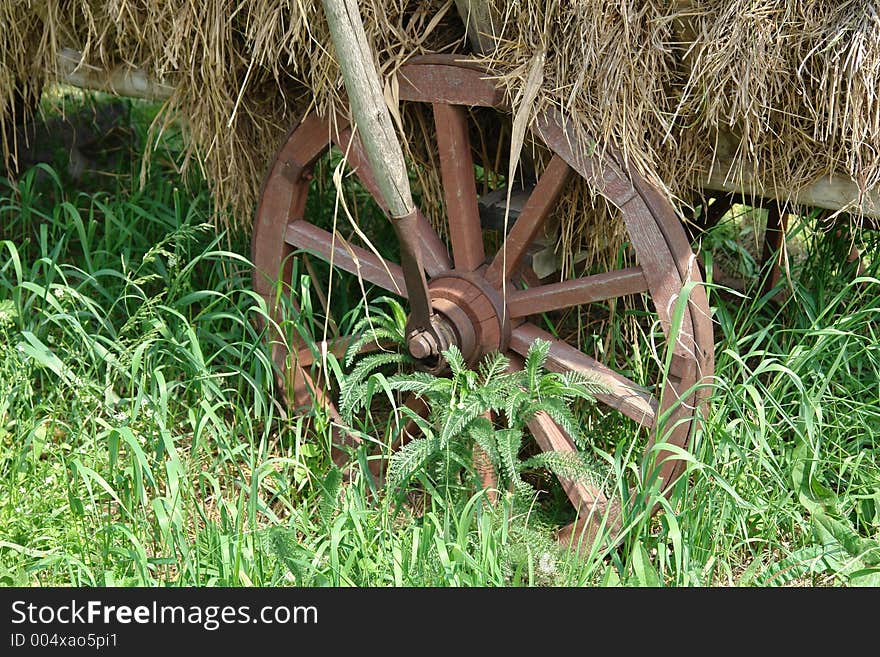 Old-time, wooden vehicle. Old-time, wooden vehicle.