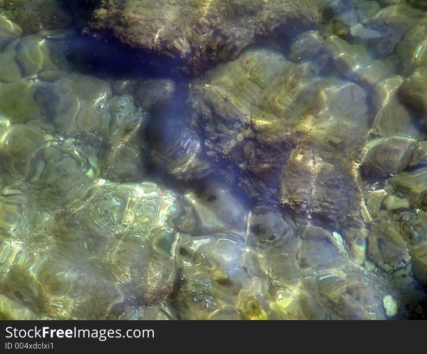 Rock in the water. Rock in the water