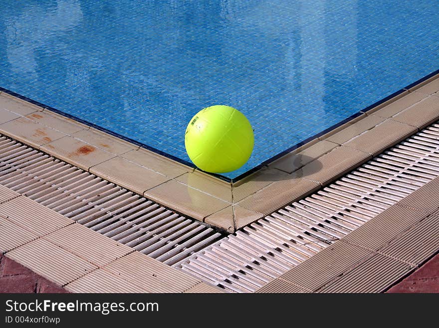 Beach Ball at the corner of a Pool