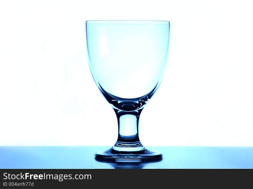 A wine glass or goblet. A wine glass or goblet