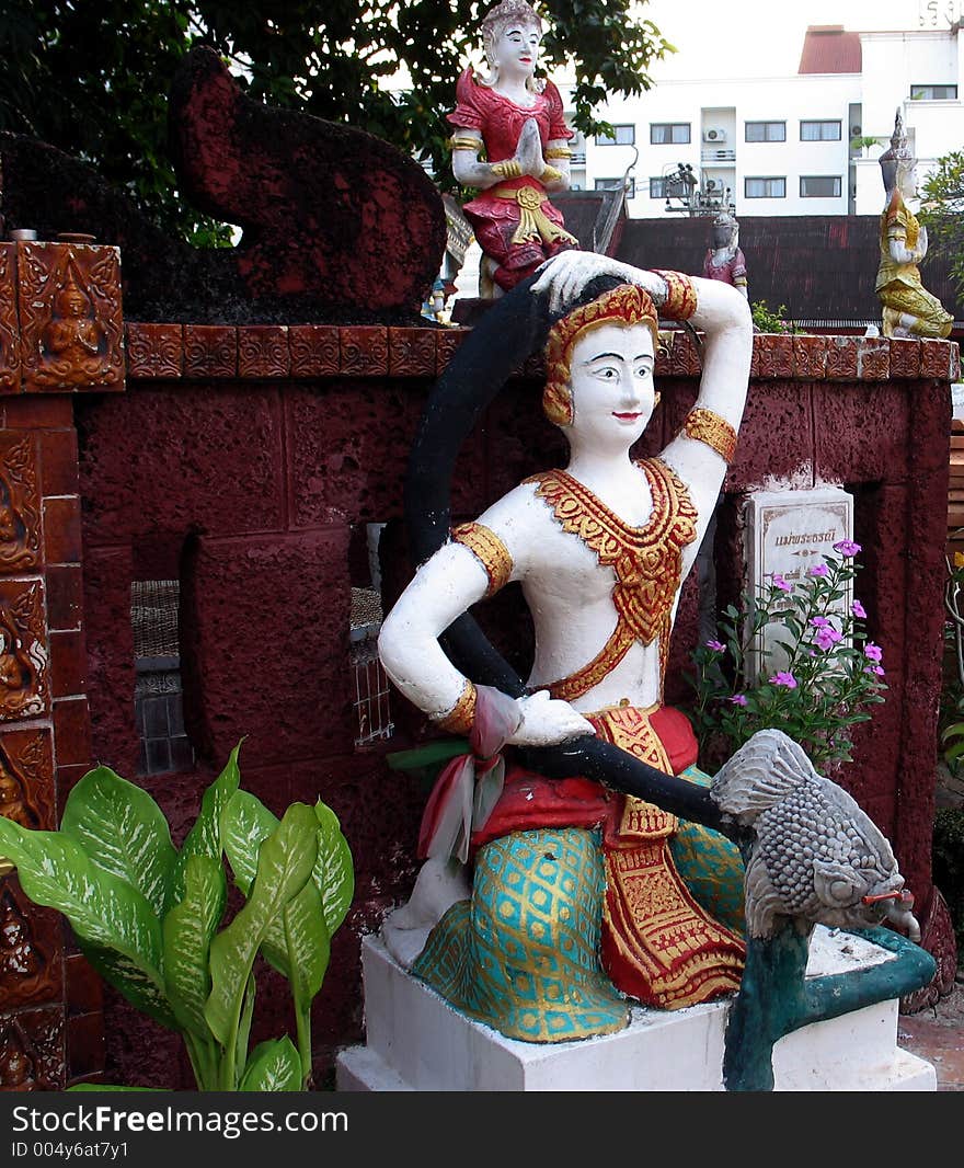 A water tap in the yard of a temple in Chiang Mai, Thailand. A water tap in the yard of a temple in Chiang Mai, Thailand