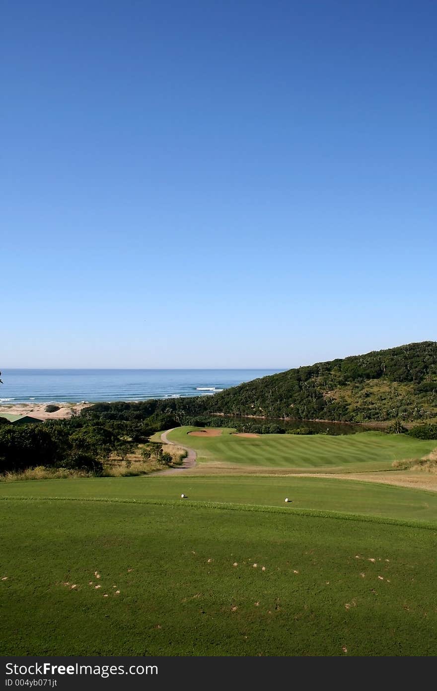 The first hole of the Wild Coast Golf Course, over looking to the Indian Ocean. The first hole of the Wild Coast Golf Course, over looking to the Indian Ocean.