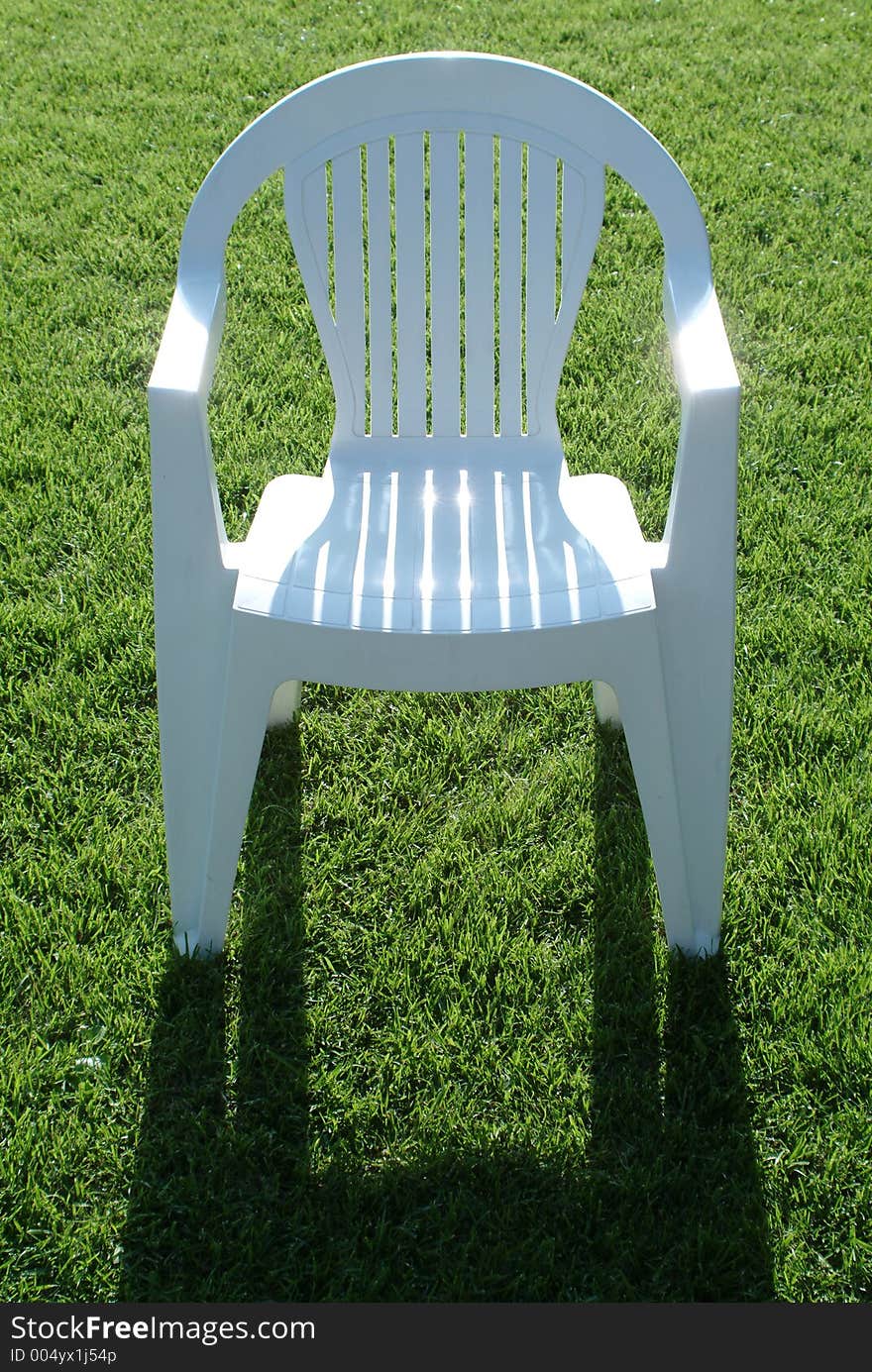 White chair on grass