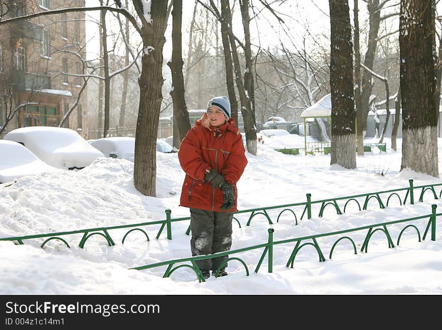 The boy in a court yard. The boy in a court yard