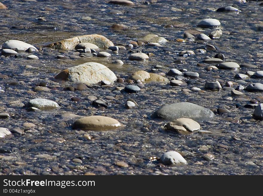 The polished stones of a stream. The polished stones of a stream.