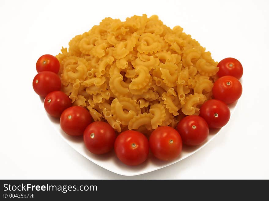 Ribbon pasta and cherry tomatoes. Ribbon pasta and cherry tomatoes