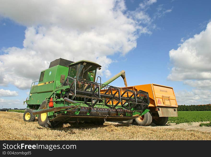 Combine unloading, Wieringermeer, Holland. Combine unloading, Wieringermeer, Holland