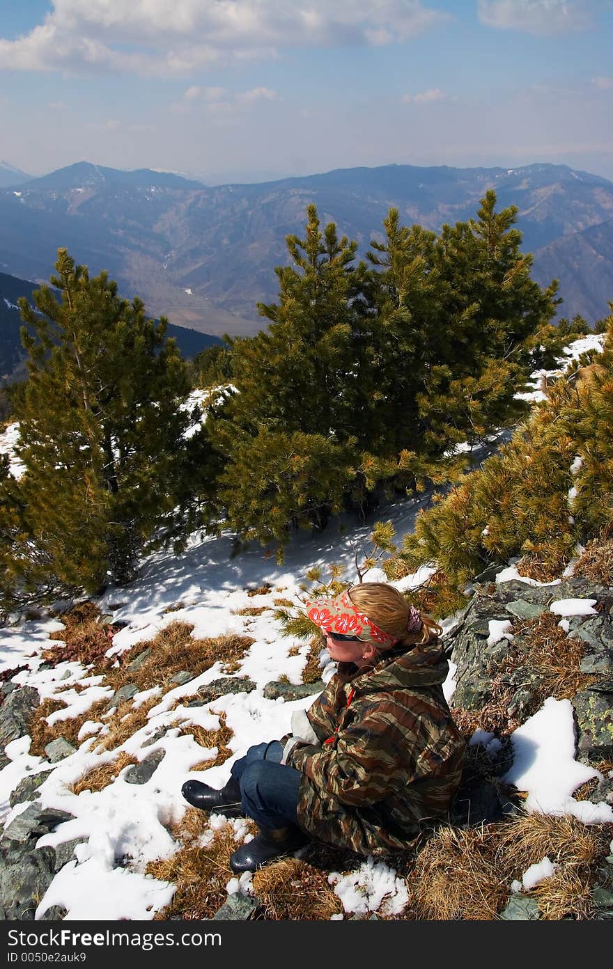 Woman and mountains.