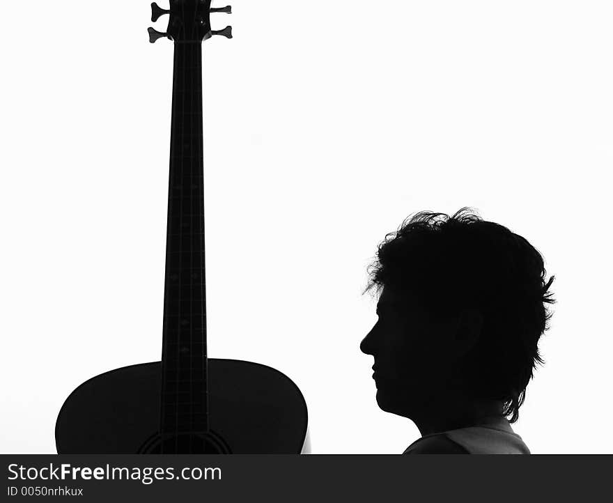 Silhouette from a woman and a guitar. Silhouette from a woman and a guitar