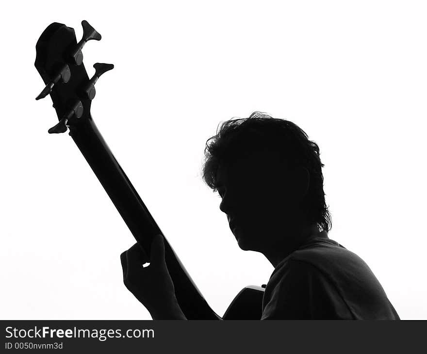 Silhouette from a woman and a guitar. Silhouette from a woman and a guitar