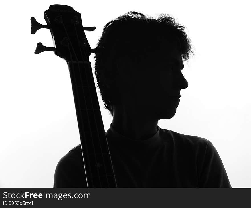 Silhouette from a woman and a guitar. Silhouette from a woman and a guitar