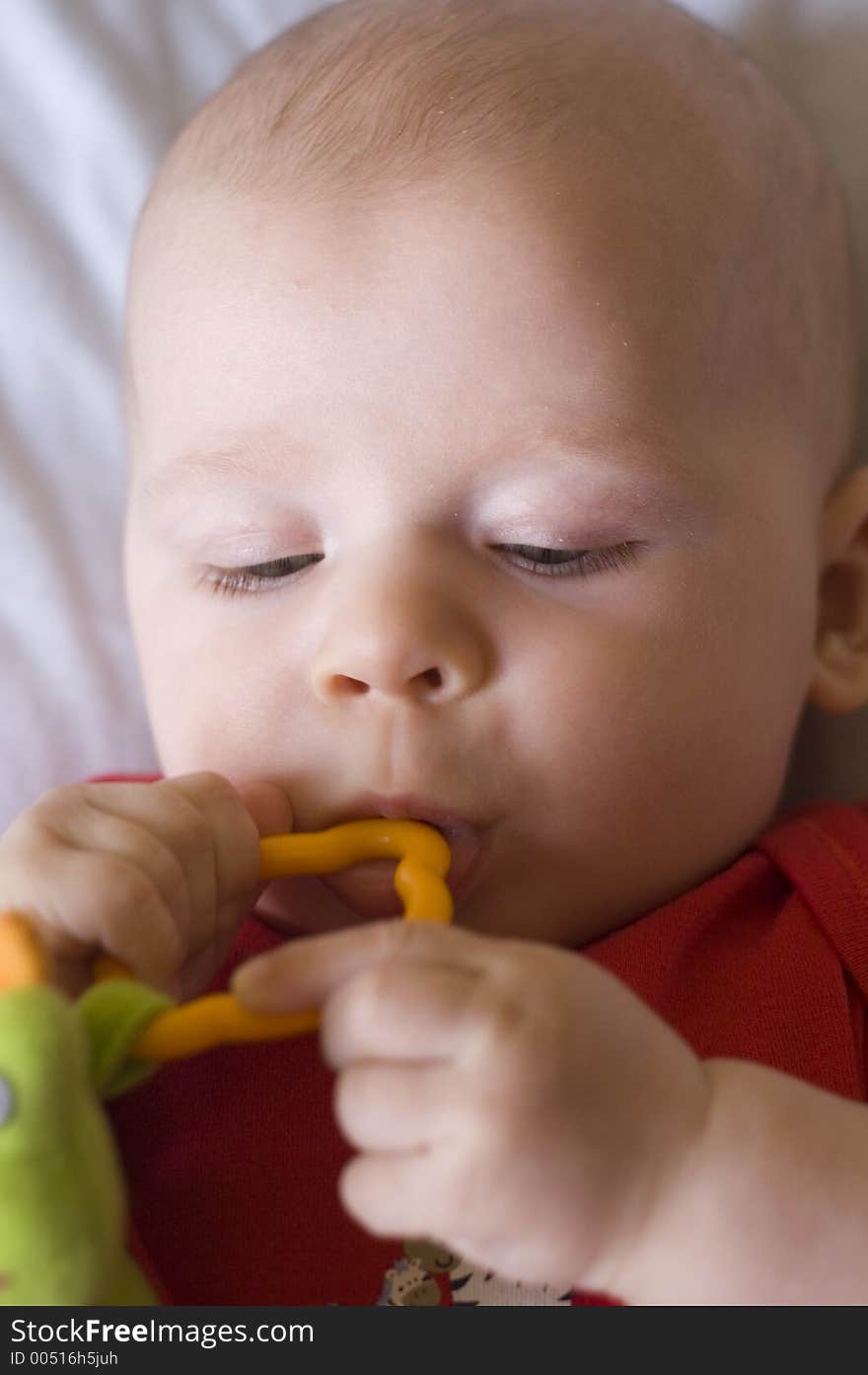 Baby with toy photo