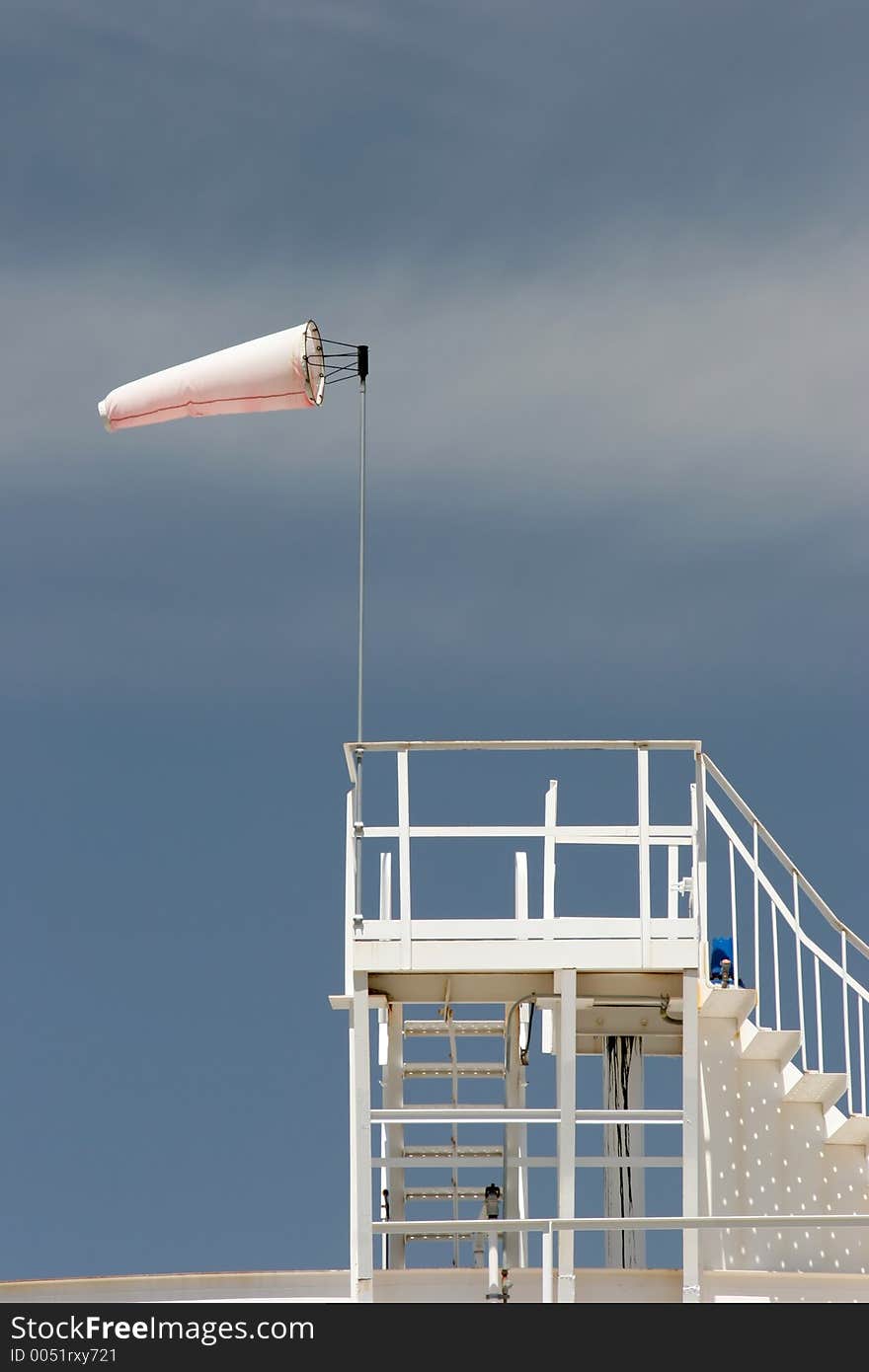 Wind sock on oil storage tank