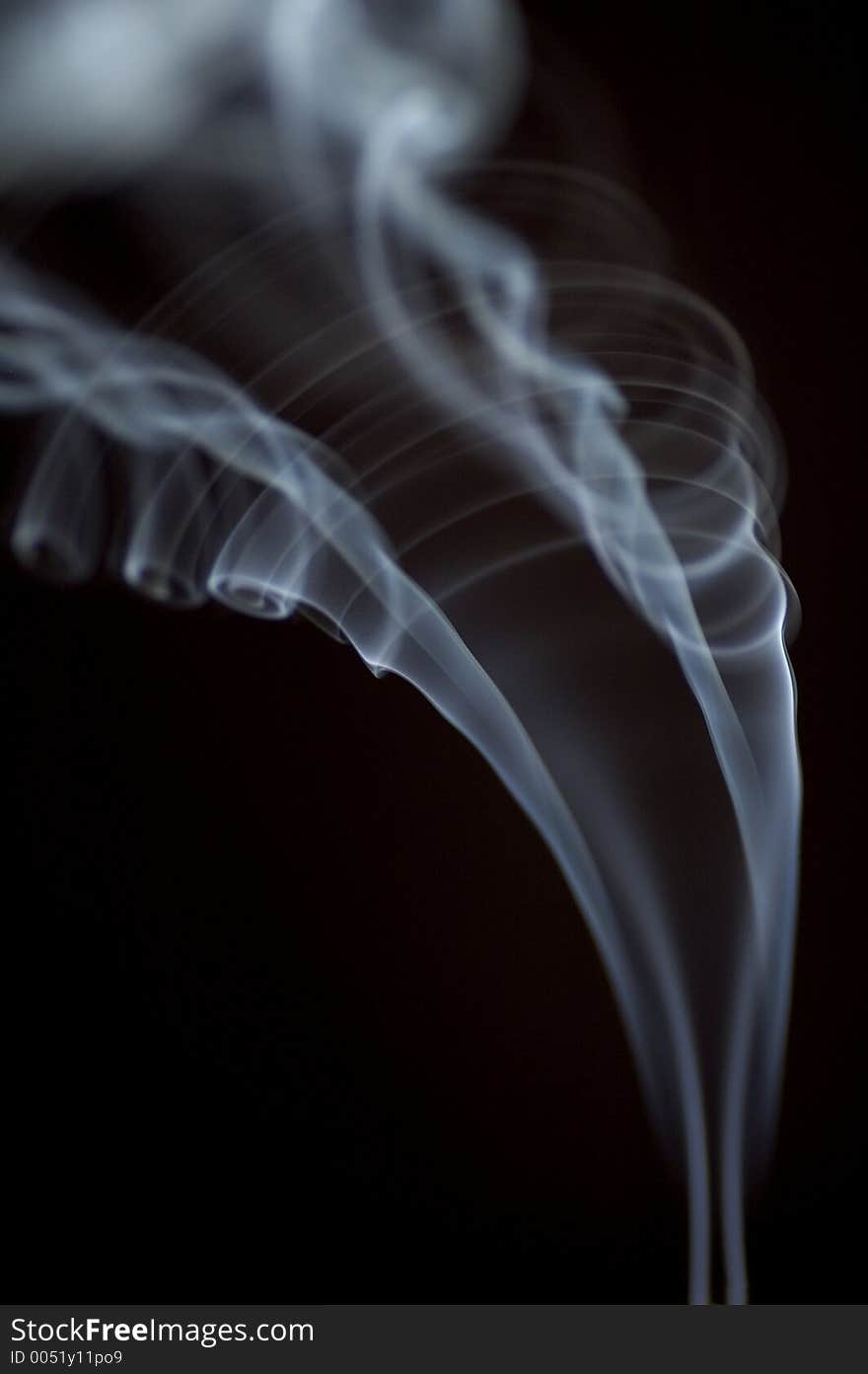 Macro shot of smoke from a burning incense. Macro shot of smoke from a burning incense