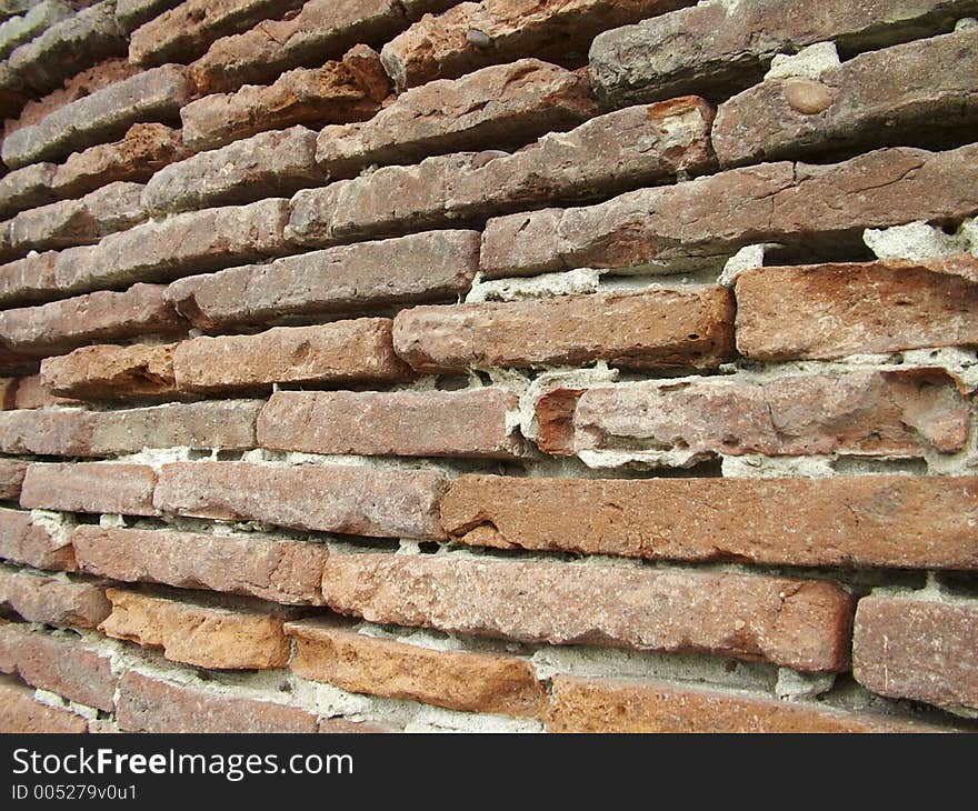 Weathered Brickwall on river bank Toulouse France. Weathered Brickwall on river bank Toulouse France