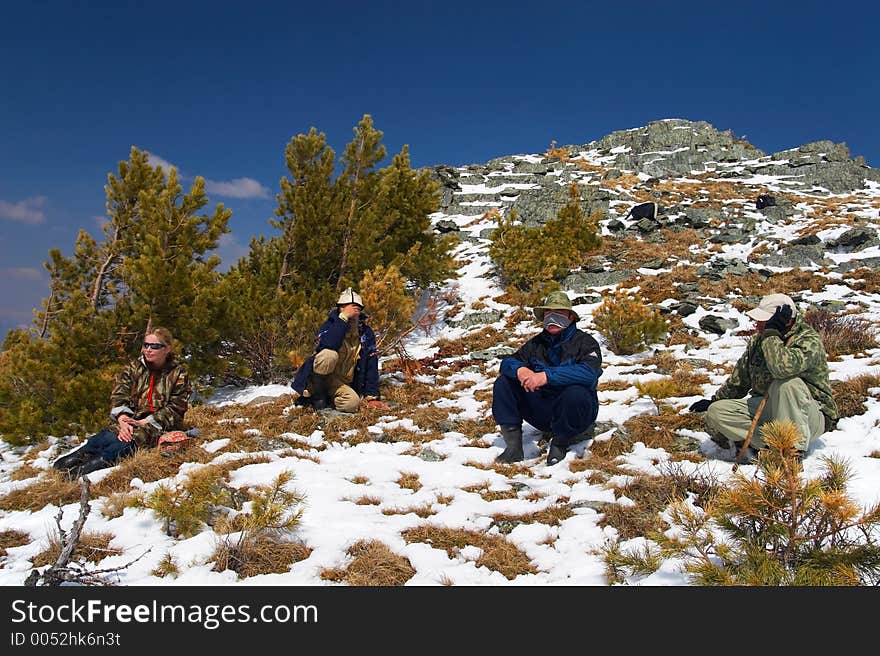 Climbers, mountains and blue sky.