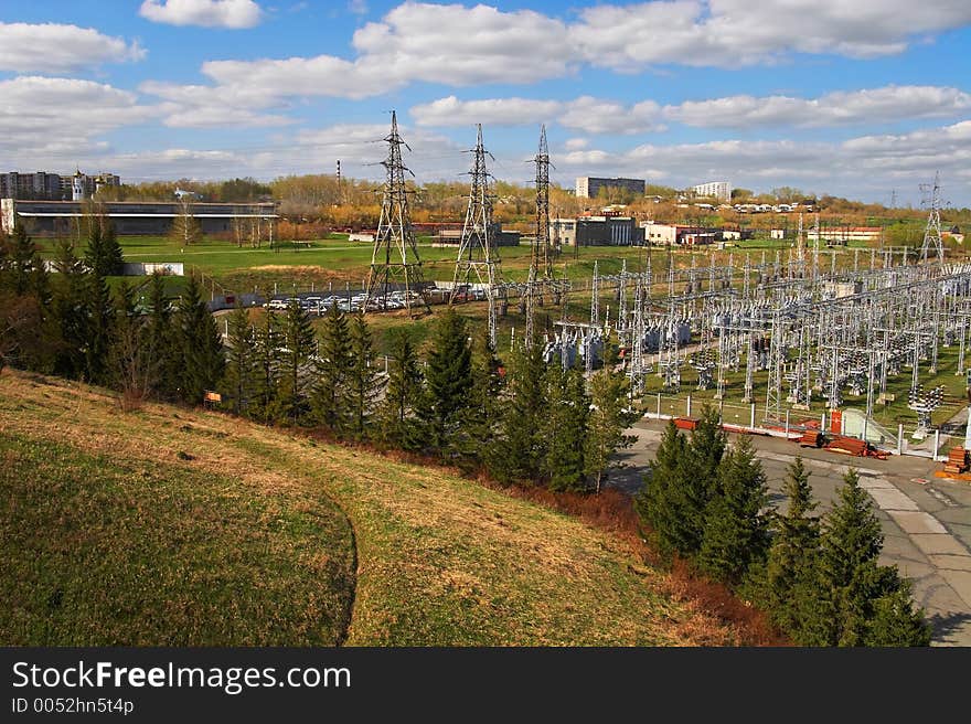 Electric power station and river. Spring.