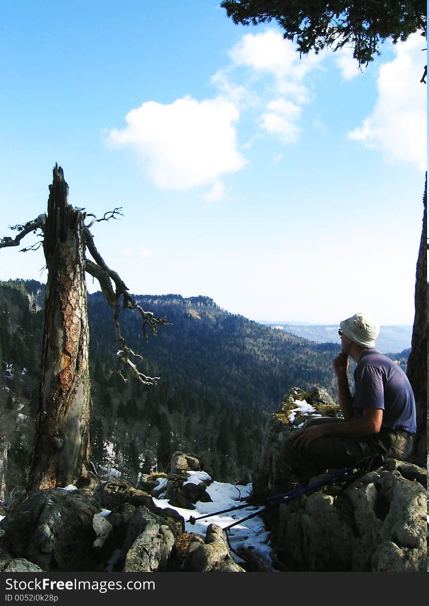 Tourist on the halt in Caucasus mountains