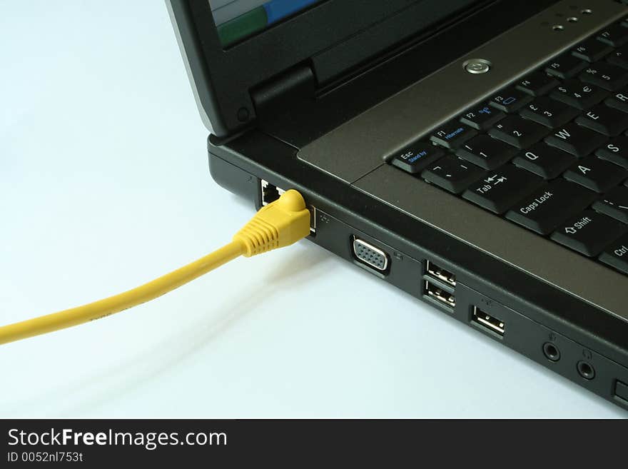 View of laptop with cable attached