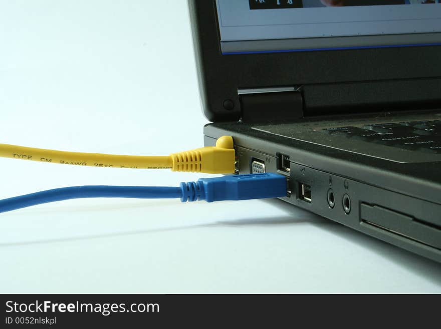 View of laptop with cables attached