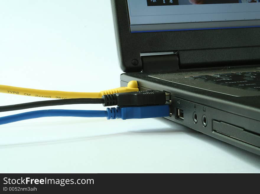 View of cables attached to a laptop