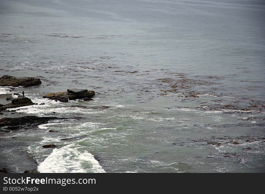 Man fishing at the ocean