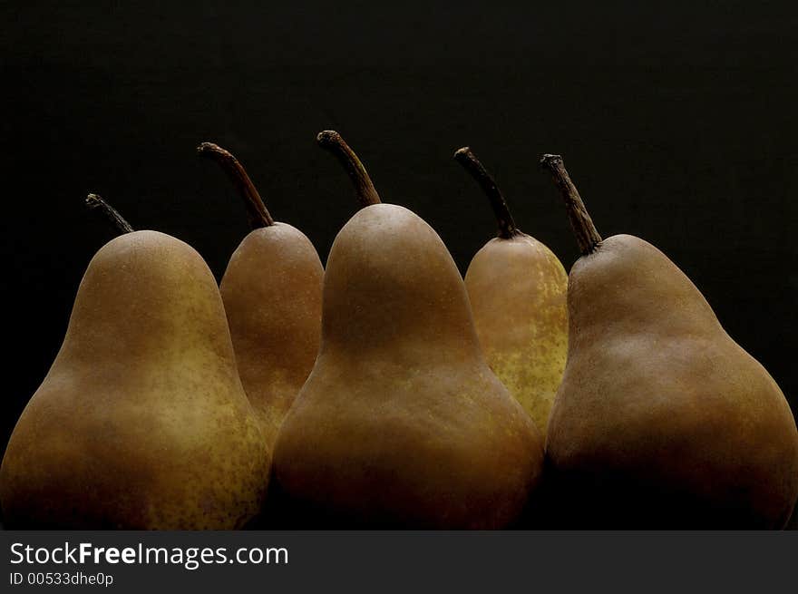 Pears on black background