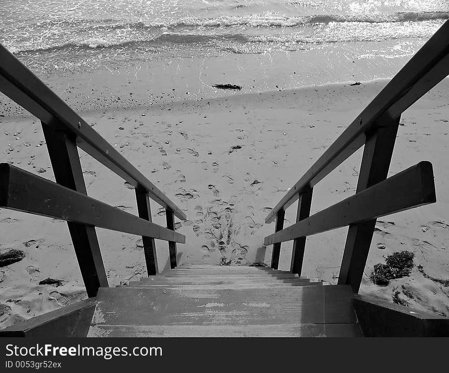 Shot from a high angle to show an intriguing shot down to the beach and sea. Shot from a high angle to show an intriguing shot down to the beach and sea.