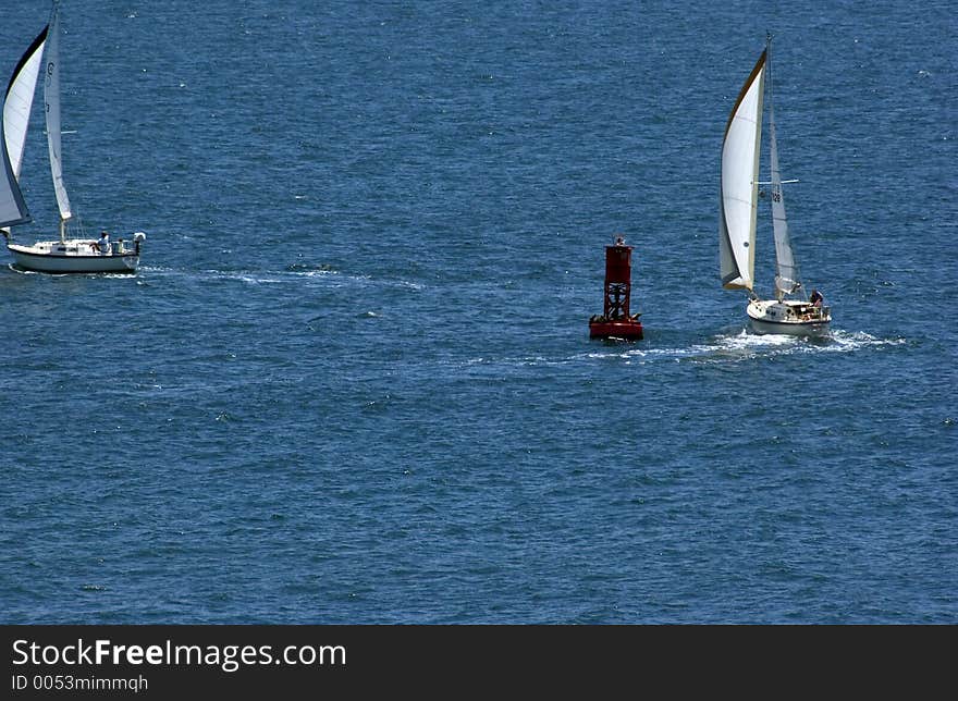 Two sail boats on the ocean