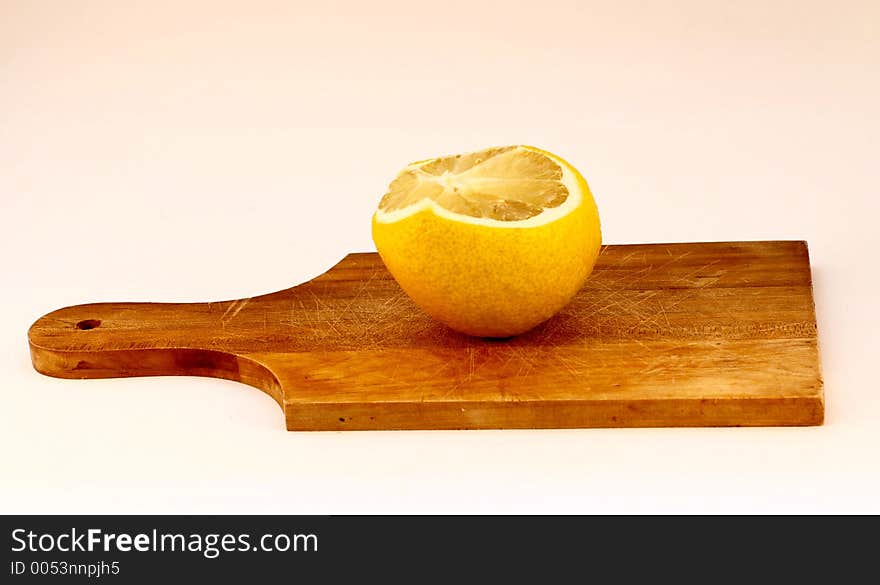 A lemon on a cooking plate, isolated