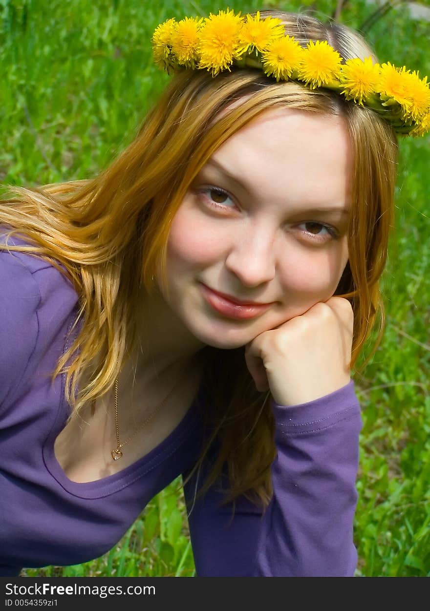 The fine provincial girl with wreath on a head