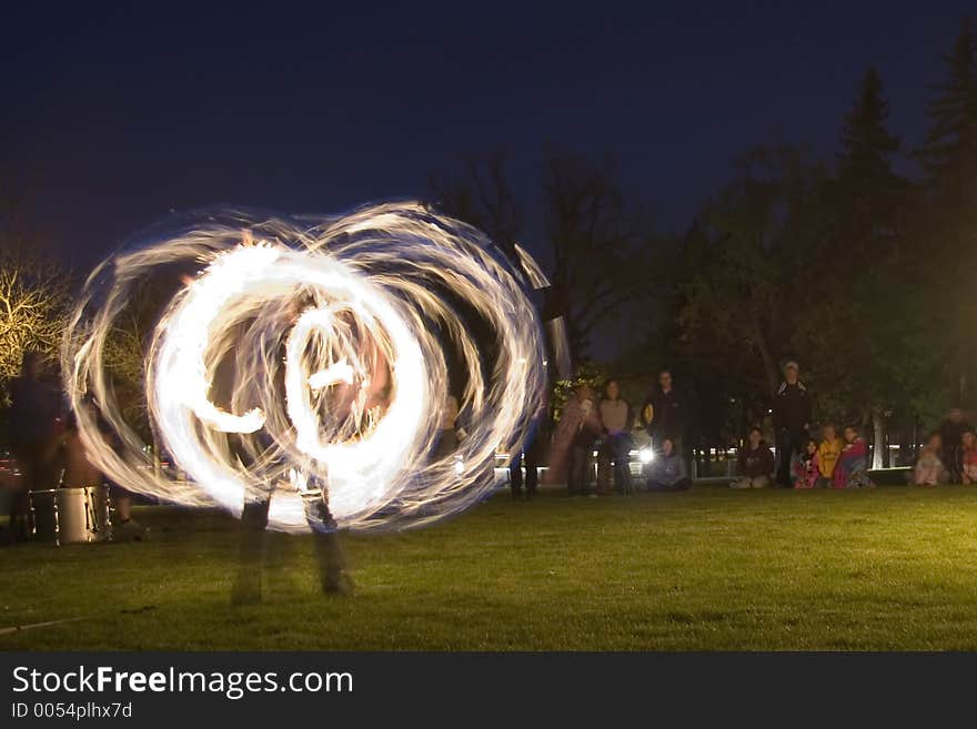 Long exposure fire dancer