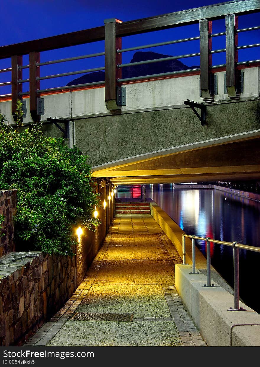 Portrait photo of waterfront canal walkway. Portrait photo of waterfront canal walkway.