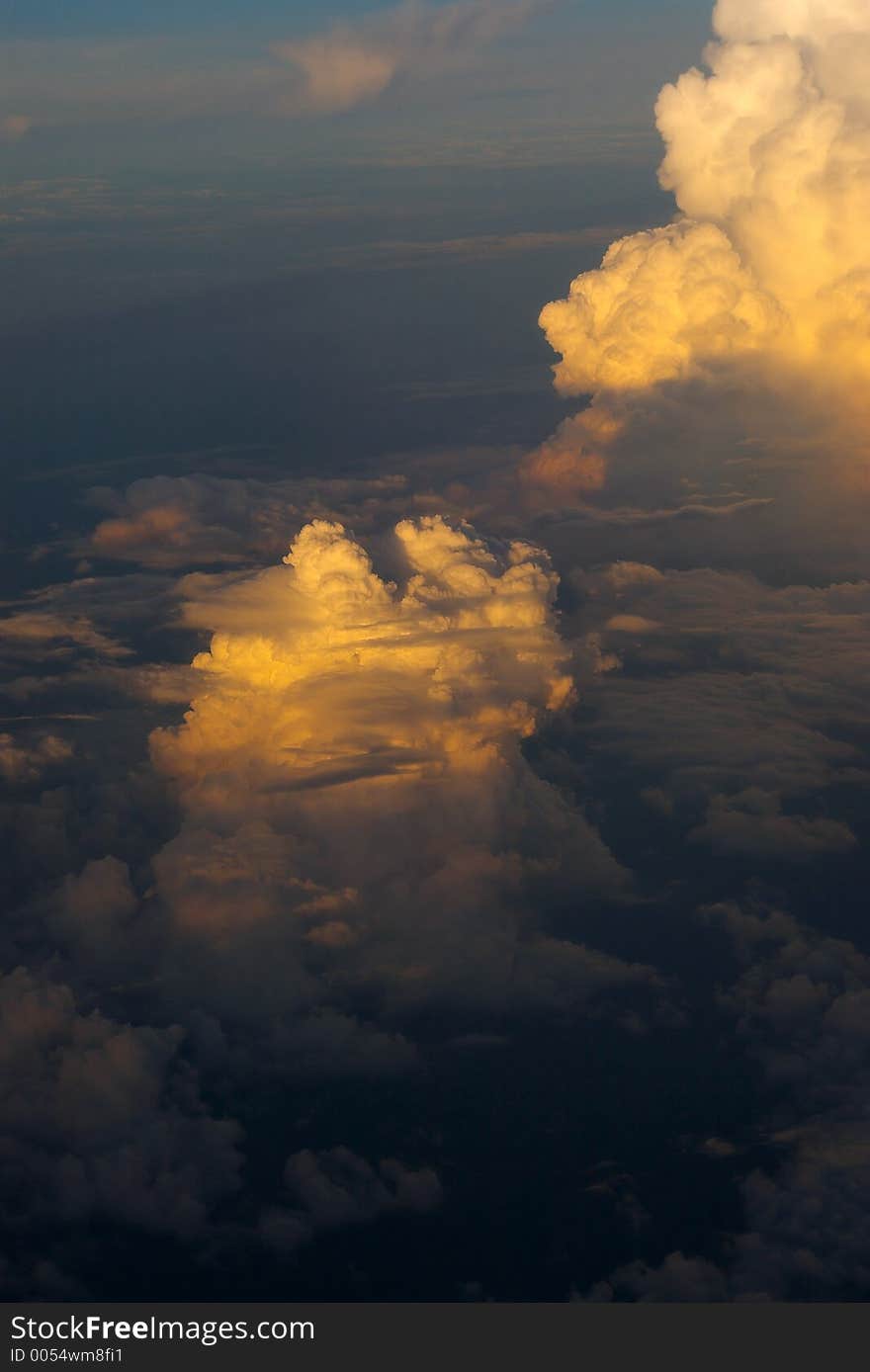 Colored clouds at sunset at 30.000 feet.