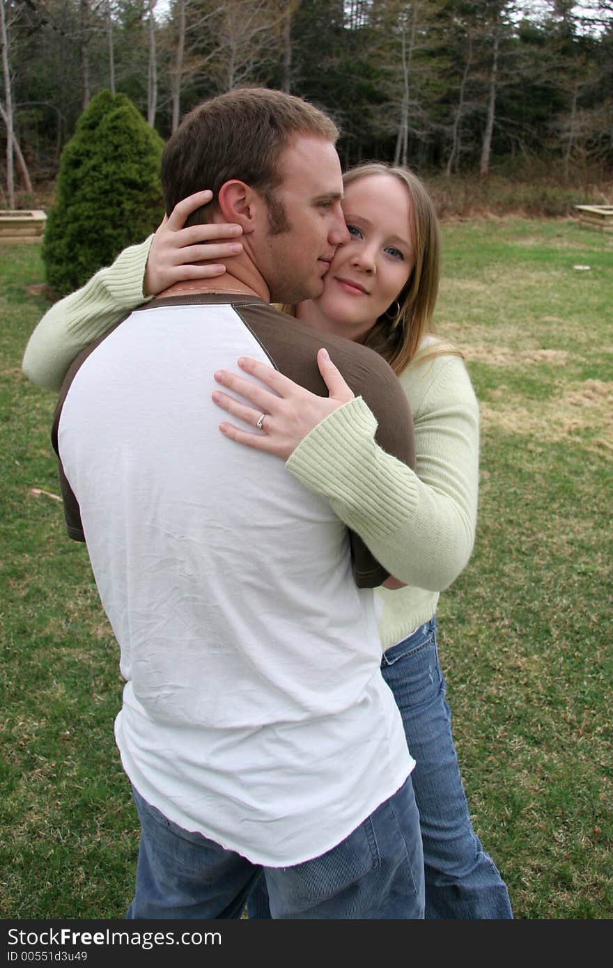 Young couple lying in grass. Young couple lying in grass