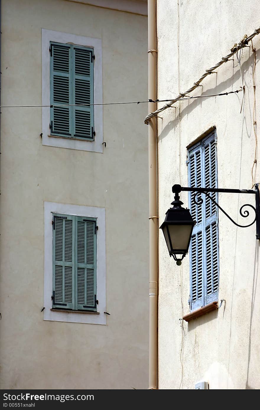 Corsica -France  in the summer: detail of shutter of an old house. Corsica -France  in the summer: detail of shutter of an old house