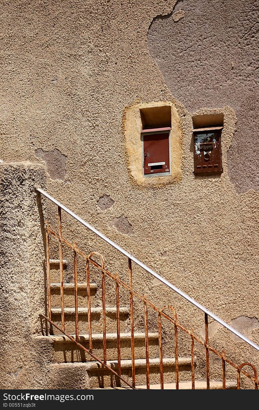 Corsica -France  in the summer: detail of shutter of an old house. Corsica -France  in the summer: detail of shutter of an old house