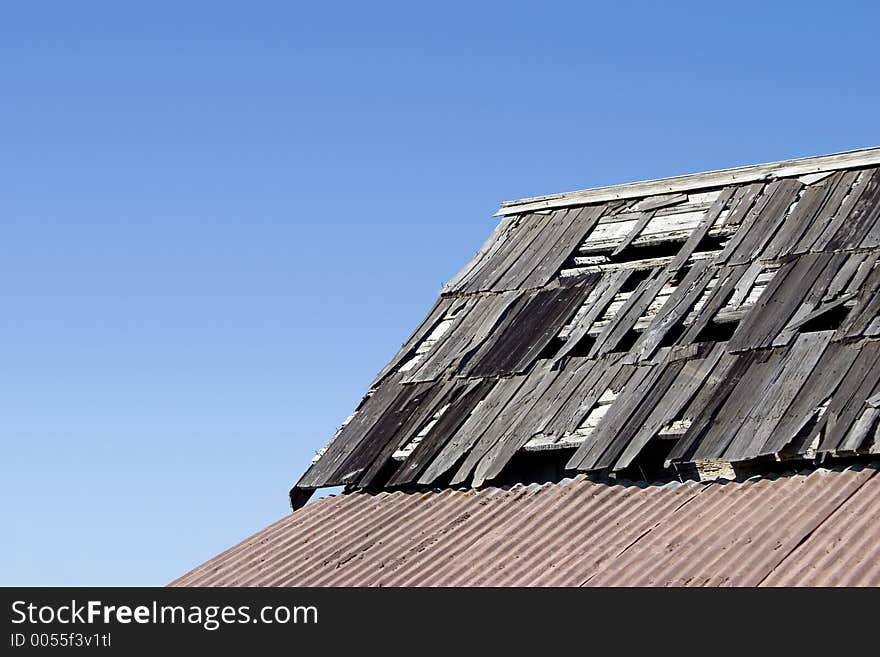 A battered and worn roof. A battered and worn roof.