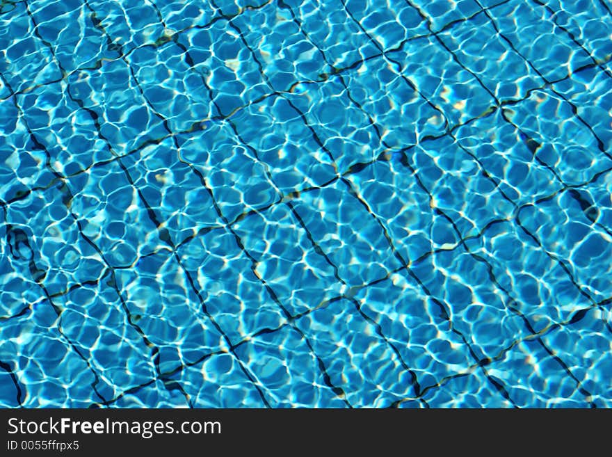 Bottom of a brand new swimming pool on a sunny summer day. Bottom of a brand new swimming pool on a sunny summer day