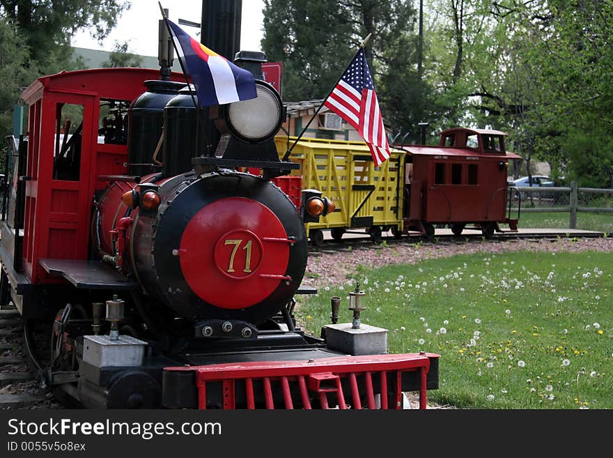 A kiddie train at a park