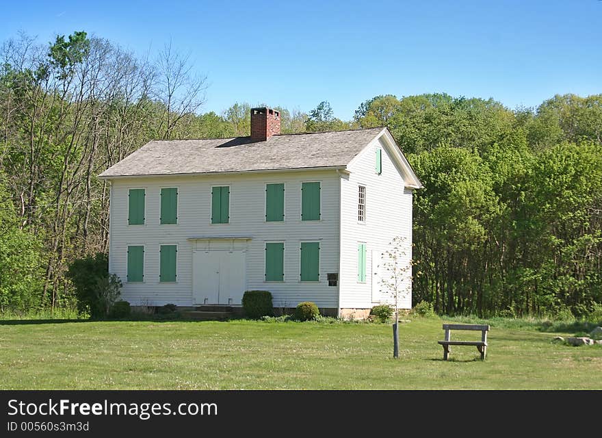 A historical home moved to a public park for restoration and preservation. A historical home moved to a public park for restoration and preservation.