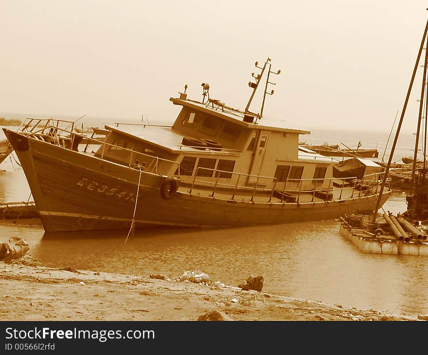 Boats in a dock, Jinjiang River, Quanzhou, China. Boats in a dock, Jinjiang River, Quanzhou, China