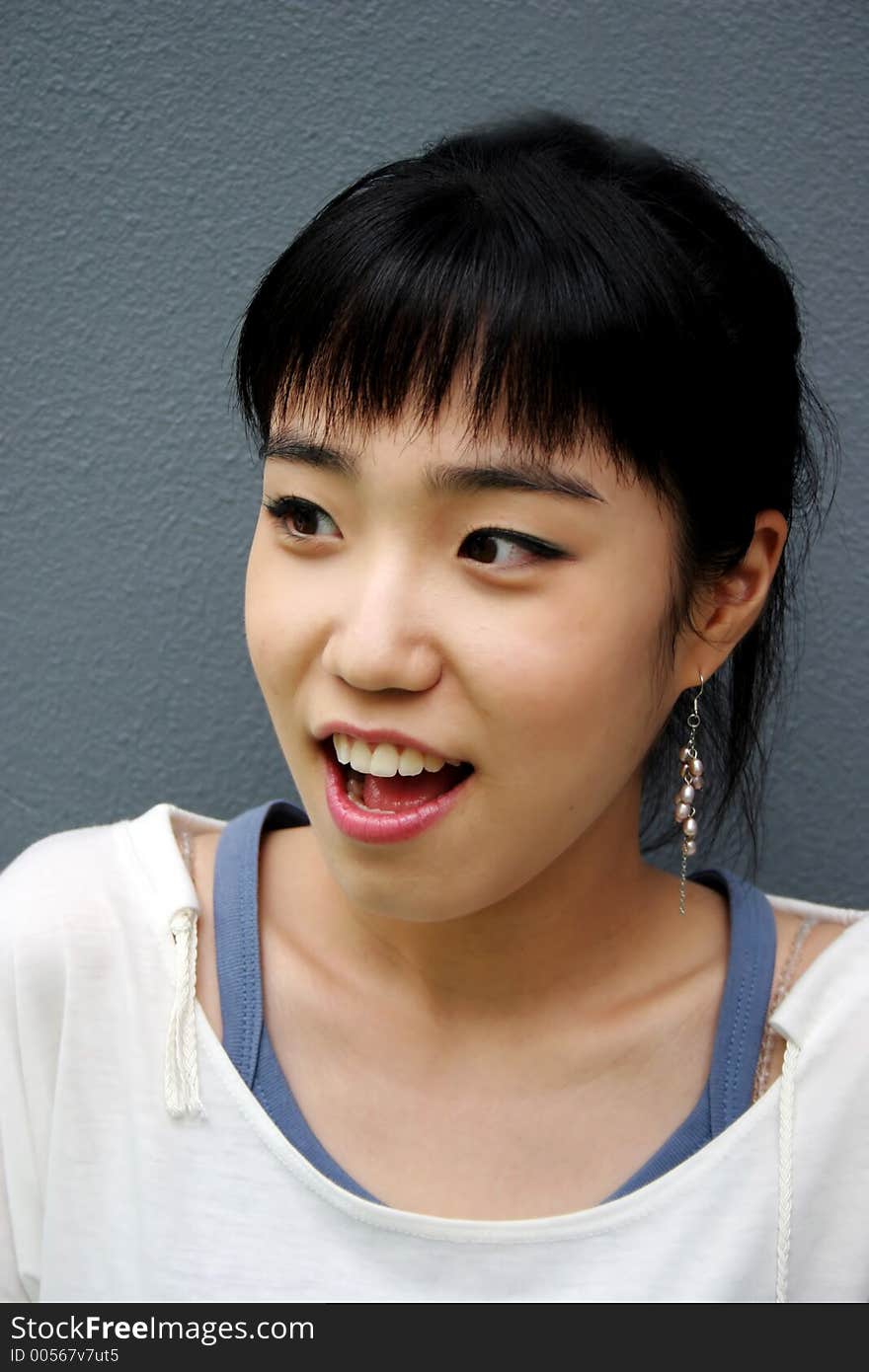 Korean girl looking surprised