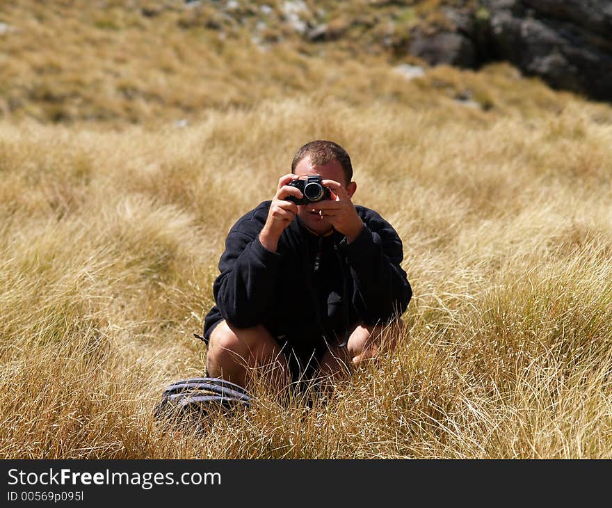 Photographer taking picture in the outdoors