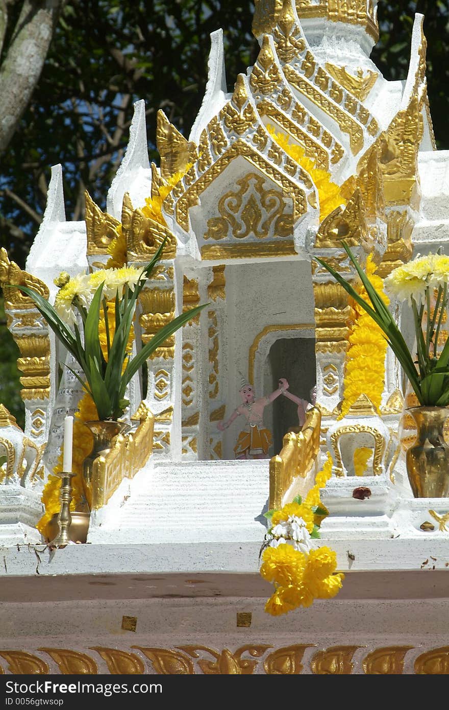 White And Gold Spirit House In Thailand