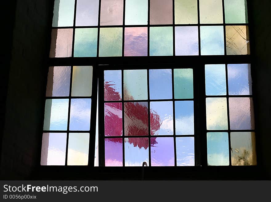 Inside a church in denmark, viw on the dk flag through the window. Inside a church in denmark, viw on the dk flag through the window