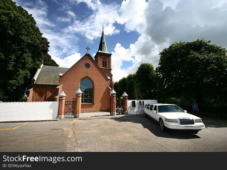 Church  with  a limo in denmark a sunny summer day