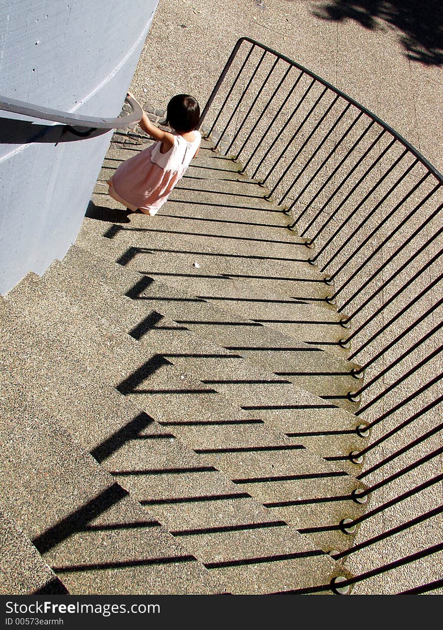 Girl on the way down stairways